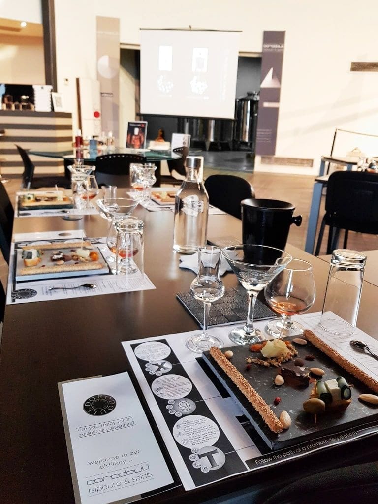 table at 'Dorodouli Tsipouro' tasting room with glasses and aperitifs
